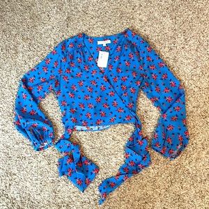 Intermix long sleeve shirt with wrap around front. Size Large. New with tags.